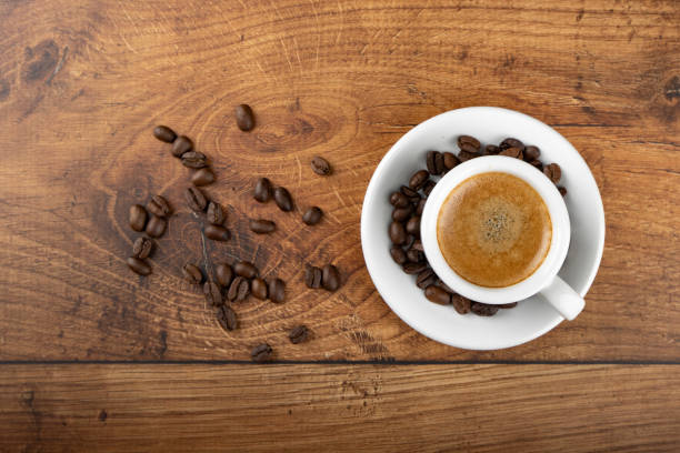 Espresso coffee cup with beans stock photo