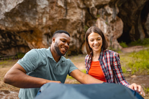 istock Two people enjoying in nature by the rock 1501767330