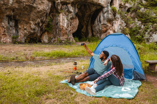 istock Two young campers taking selfie on mountain camping 1501767470