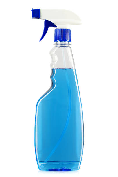 Blue detergent in a spray bottle. Isolated on white background. Blue detergent in a spray bottle. Isolated on white background. File contains clipping path spray bottle stock pictures, royalty-free photos & images