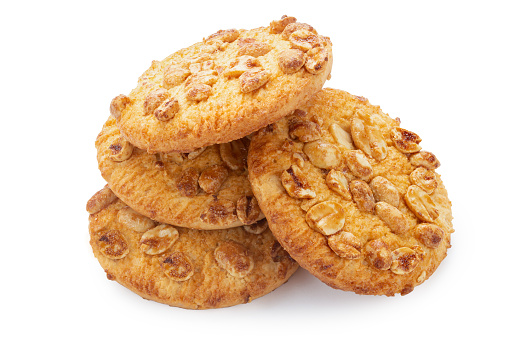 Round shortbread cookies with peanuts. Isolated on white background. File contains clipping path