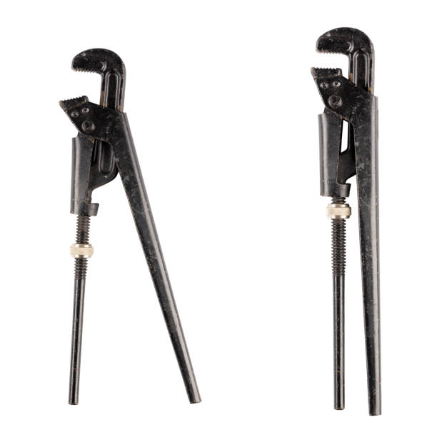 Pipe wrench isolated on white background. Black adjustable pipe wrench tool. File contains clipping path. Top view.