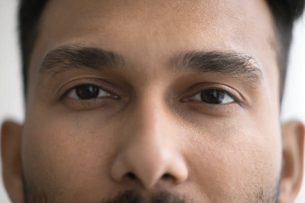 istock Upper face of handsome young Indian man with black eyebrows 1501770426