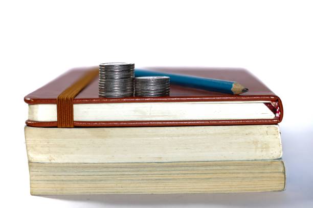 Money and books is and future growth of everything makes knowledge of student reading and writing are book.pictures concept isolated picture.