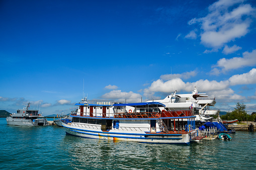 Phuket, Thailand - Apr 26, 2018. Ferries docking at Rassada Harbour in Phuket, Thailand. Phuket lies off the west coast of Thailand in the Andaman Sea.