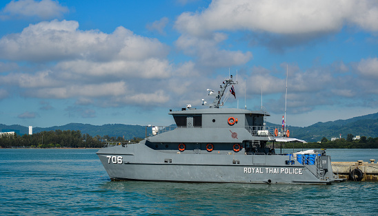 Phuket, Thailand - Apr 26, 2018. Royal Thai Police ship docking at Rassada Harbour in Phuket, Thailand.