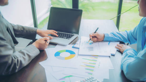istock Business team working on a new business plan with modern digital computer 1501773381