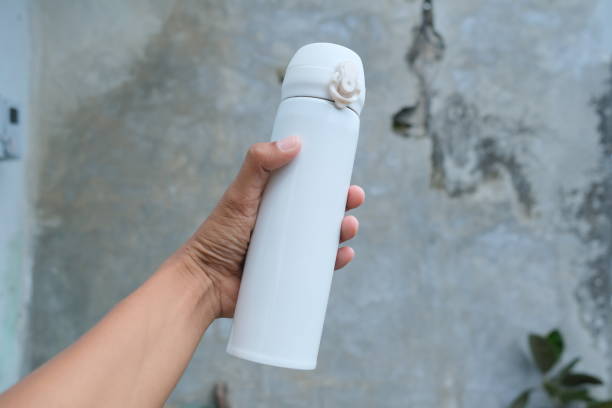 istock photo of a white drinking bowl held in hand 1501773731