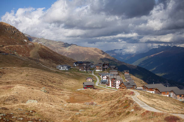 istock Mountain village in the Swiss alps under cloudy sky. 1501774165