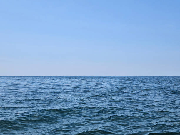 istock Blue Lake Michigan Water with Horizon 1501774894