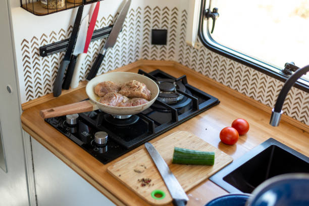 istock older man cooking in his motorhome,Cooking on the Go 1501775007