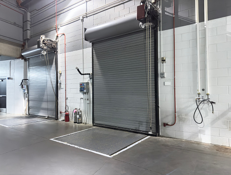 Warehouse entrance and loading docks with closed shutters