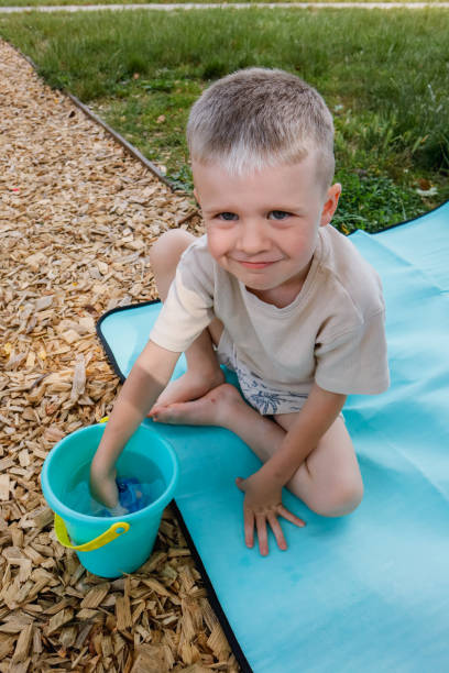 istock A child plays with a water gun on the playground 1501780154