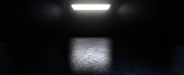 istock Dark room with white glowing lamp background 1501781534