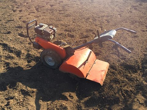 Agriculture plowing machine on the soil field