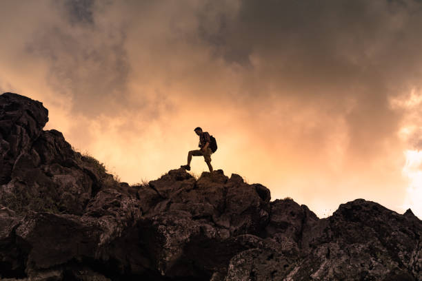 istock Male hiker walking on the mountain ridge. 1501785695