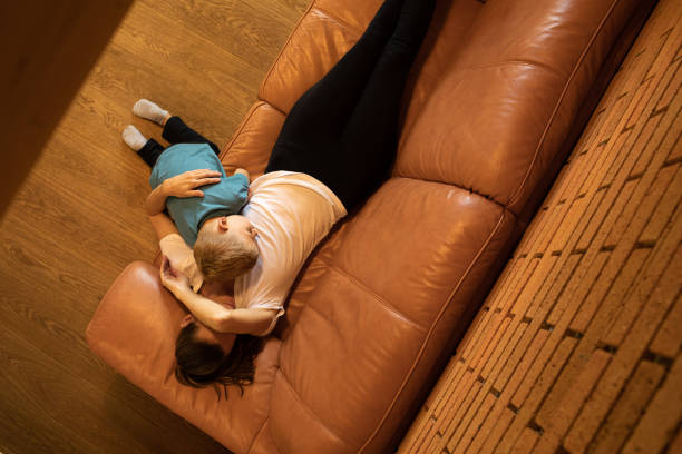 istock Sad single mother and child at home. 1501785790