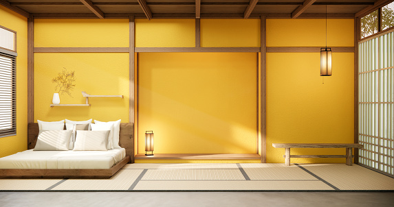 Minimal yellow interior mock up with zen bed plant and decoartion in japanese bedroom. 3D rendering.