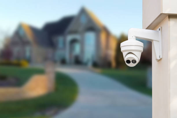 istock Security camera and private house on the background. 1501792923