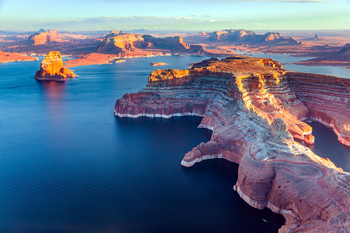 Aerial view of Lake Powell and rocky mountain against sky, Glen Canyon National Recreation Area, Arizona, USA.