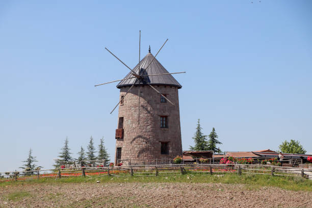 istock Windmill and blue sky. Photo of windmill with harvests 1501818911