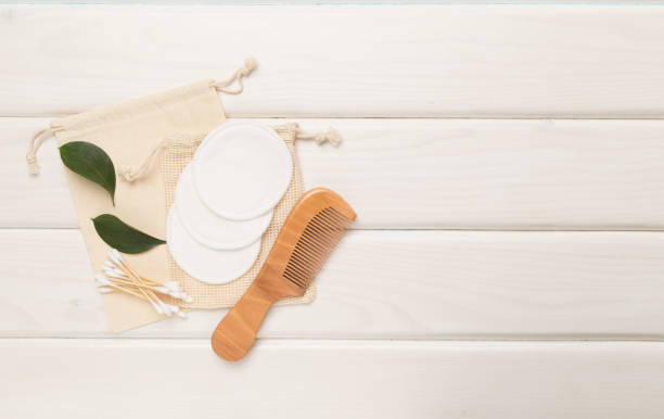 istock Flat lay with natural biodegradable accessories on wooden background, top view 1501852909