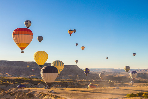 CAPPADOCIA, TURKEY - JULY 29, 2017: Hot air Balloons flight in Cappadocia, Nevsehir, Turkey in a beautiful summer day