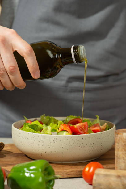 istock Vegetable salad dressing with oil 1501893470
