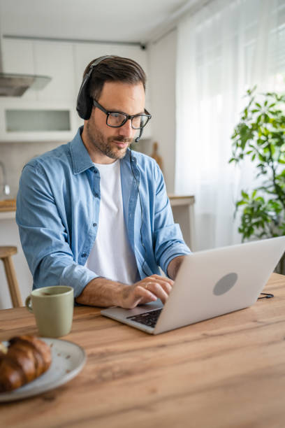 istock One man caucasian male freelancer work from home on laptop computer 1501897278