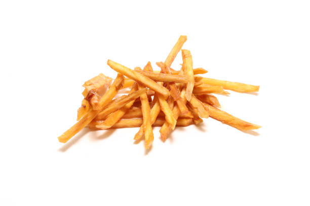 istock Fried sweet potato coated with sugar isolated on a white background. 1501899699