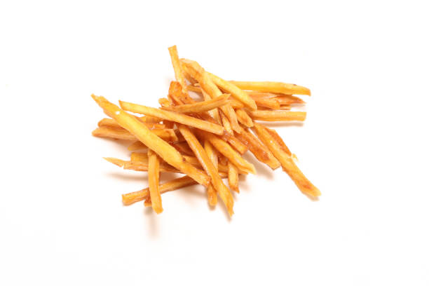 istock Fried sweet potato coated with sugar isolated on a white background. 1501899732