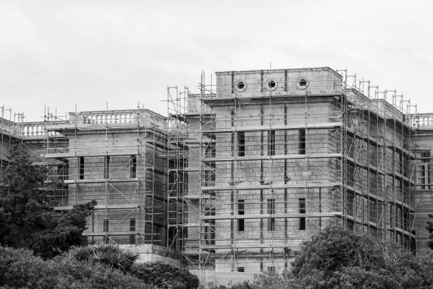 istock Grayscale shot of buildings under construction in the daylight 1501899772