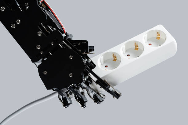 istock Real robotic hand with power strip  Concepts of AI development 1501903206
