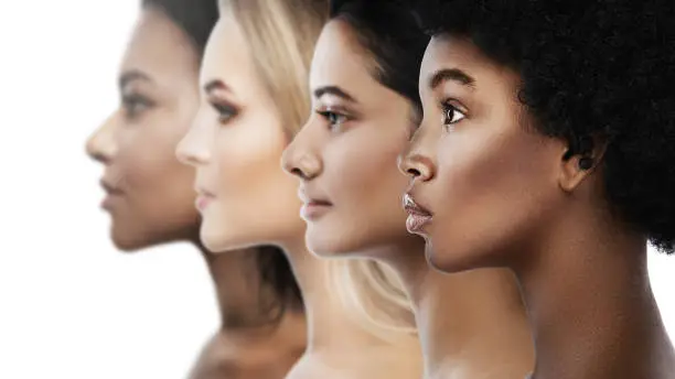Multi-ethnic diversity and beauty. Group of different ethnicity women against white background.