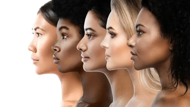 Multi-ethnic diversity and beauty. Group of different ethnicity women against white background.