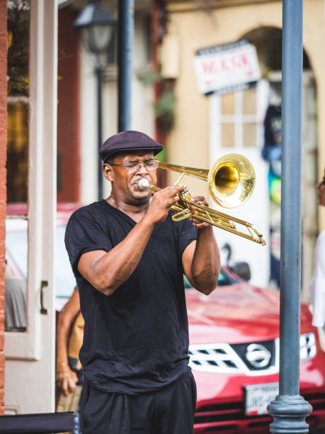 New Orleans, Louisiana, USA, August 27, 2017: a man playing the trombone in the street.