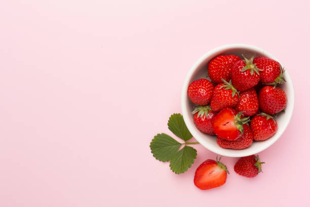 istock Strawberries on color background, top view 1501912227