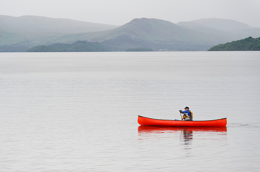 Kayak on peaceful calm water on Loch Lomond UK