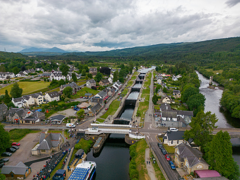 This aerial drone photo shows the large boat lock in Fort Augustus. The boat lock connects the Caledonian canal with Loch Ness in Scotland.