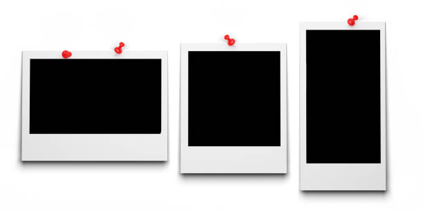istock Several photo frames of different sizes, fixed with a pushpin. Empty photo frame for your design. 3d render 1501956763