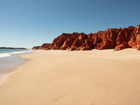 A perfect beach, red cliffs and turquoise water at Cape Leveque