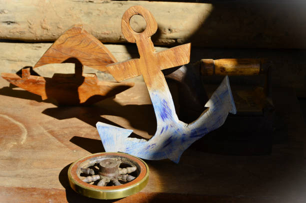 istock Wooden decorative anchor in the sun 1501971395