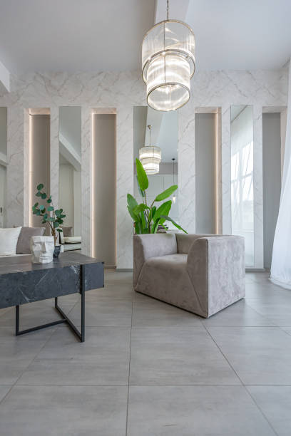 istock stylish bright modern bedroom interior with decorative niches with LED lighting and a huge panoramic window in gray and white colors and geometric shapes 1501974039