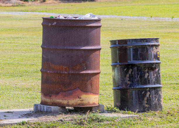 Rusty tin can at the beach - environmental pollution