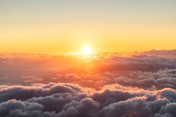 Sunset above the clouds in Maui, Hawaii.