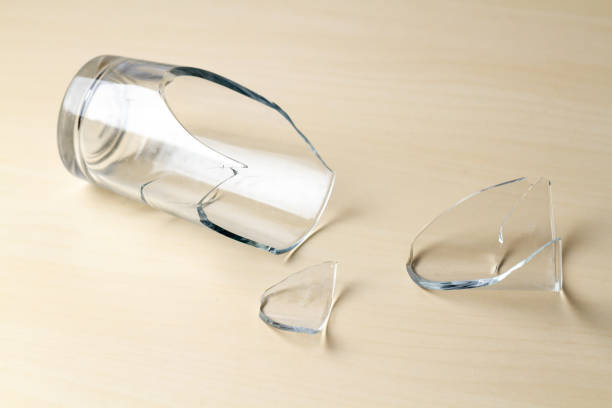 istock Broken glass and glass splinters close up 1502018752