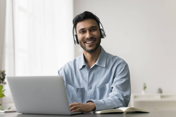 istock Happy young Indian professional business man, operator, customer portrait 1502024235
