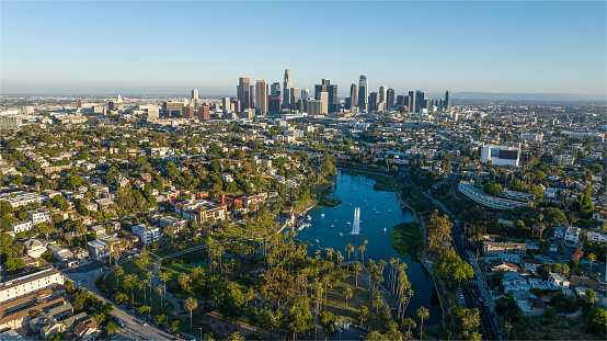 Drone shot of Echo Park Lake and downtown Los Angeles.