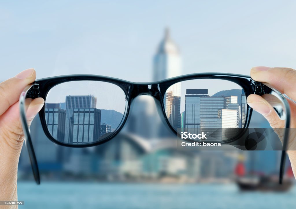 Eye glasses looking to cityscape Change Stock Photo