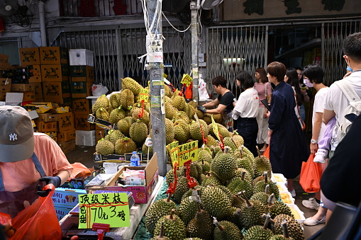 Hong Kong - August 15, 2023 : People at food shops in Sham Shui Po, Kowloon, Hong Kong.